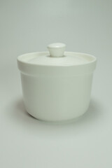 white ceramic container with a white background