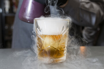 alcohol cocktails decoration with dry ice. beverage
