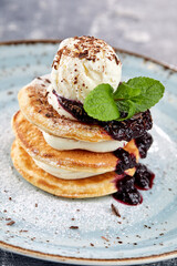 pancakes with ice cream and berries