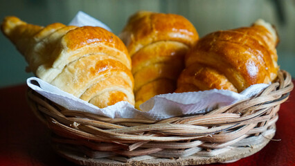 A basket of freshly baked croissant 