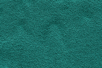 Fototapeta premium Closeup view of mint beads as background