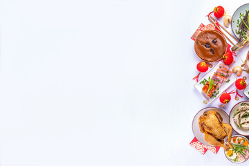 Traditional Chinese lunar New Year dinner table, party invitation, menu background with pork, fried fish, chicken, rice balls, dumplings, fortune cookie, nian gao cake, noodles, chinese decorations