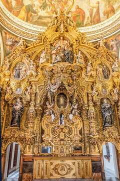 Seville, Spain - November 12, 2022: Altarpiece inside the Church of San Luis de los Franceses of baroque architecture from the 18th century in the historic center of Seville, Andalusia, Spain