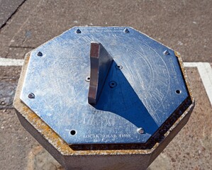 Metal sundial along the promenade, Sidmouth, Devon, UK, Europe