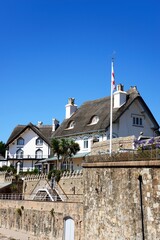 View of traditional thatched houses overlooking the beach, Sidmouth, Devon, UK, Europe