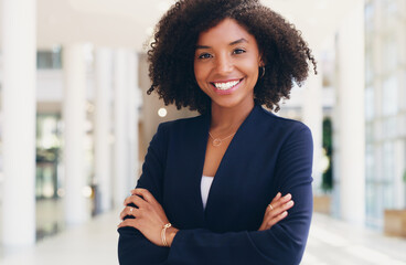 Corporate woman, portrait and leader smile in office with arms crossed. Business manager, happy ceo and startup leadership motivation in modern workplace or black woman entrepreneurship empowerment