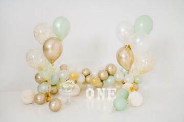 One year decoration in gold and green colors