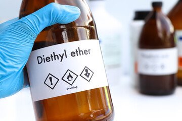 Diethyl ether in glass, chemical in the laboratory and industry
