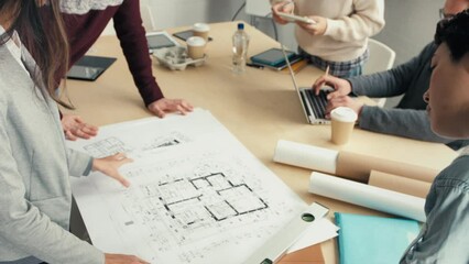 Meeting, architecture and collaboration with architect and blueprint plan, working together and planning with team and engineering graphic. Startup, industry and paperwork on table with teamwork.