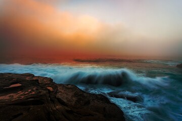 Fototapeta na wymiar Foggy sunrise Sydney coast seascape
