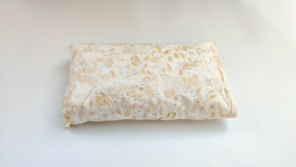 Indonesian tempeh on a white background