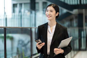 Portrait of a beautiful young Asian businesswoman at the company