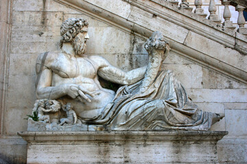 Stone ancient bas-relief of Neptune in Rome