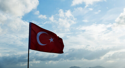 Turkish flag waving on sky