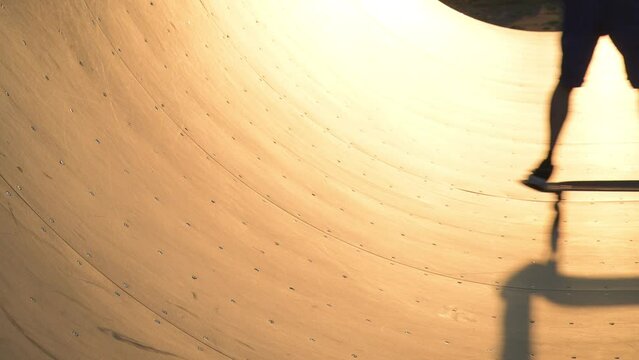 half pipe at sunset in slow motion