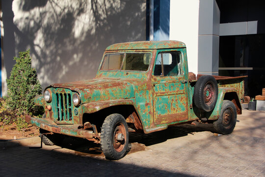 An old rarity rusty green truck