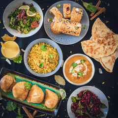 fried rice, samosa , salad, roti, with tea