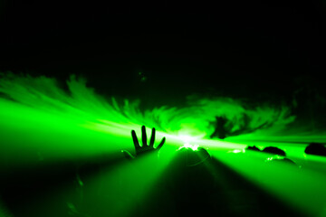 Obraz na płótnie Canvas Crowd and blurred green light