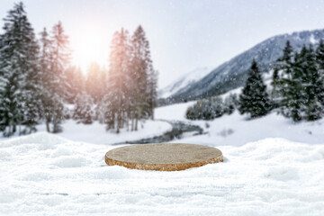 Obraz premium A minimalist composition with snow, against the background of a beautiful winter landscape and free space