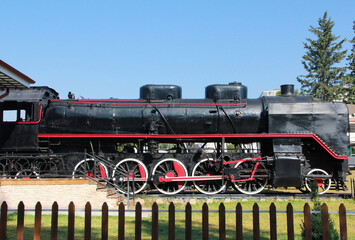 Vintage rare black steam locomotive with red decorative trim