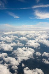 Fototapeta na wymiar Passenger aircraft view over clouds