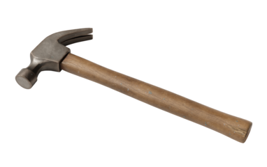 Lying hammer with a wooden handle against a white background with clipping path