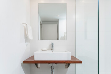 Fototapeta na wymiar Bright white clean modern bathroom
