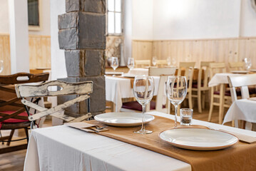Served tables in an empty restaurant