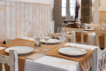 Served tables in an empty restaurant