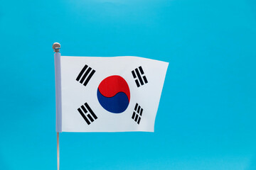 South Korean flag waving on blue background