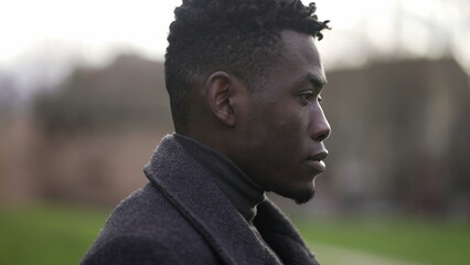 Thoughtful black African man portrait face close-up, tracking shot