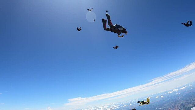 Skydivers jumping above Brasilia City