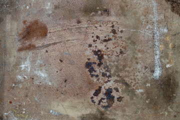 Grunge rusty metal background or texture with scratches and cracks, closeup, top view