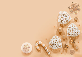 Christmas ornaments background. Isolated on golden background and copy space. Top view.
