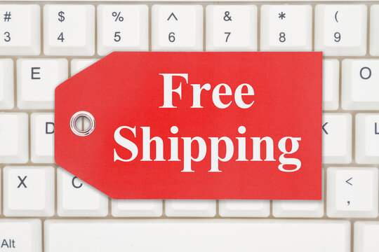 Free Shipping message on a gift tag on a keyboard