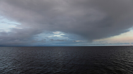 rainy clouds over the sea 