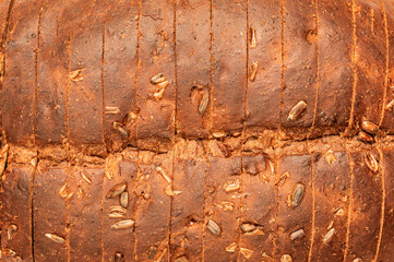 Organic wholegrain bread as a  background closeup. Pattern. Fresh bread texture - Powered by Adobe