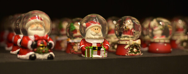 Fototapeta na wymiar New Year. Santa Claus in a ball. Snow Globe