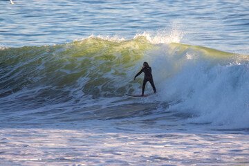 Surfing big winter waves at Ventura Point in California