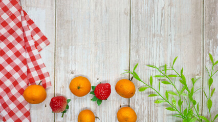 wooden background with red napkin and fruit for kitchen background, prepare food and drink, restaurant