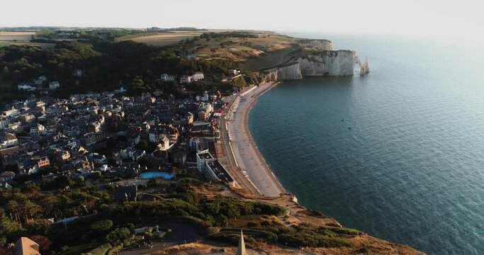 Aerial view of Chapelle des pecheurs church on top of hill overlooking the village of &Eacute;tretat