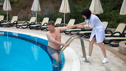 Woman doctor forbids swimming pool to a drunk man tourist.