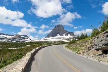 Scenic road-side view of Glacier National Park rocks on a sunny day