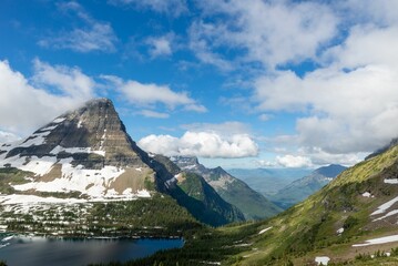 Scenic view of the lake and valley in Glacier National Park on a sunny day