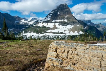 Scenic view of mountains in Glacier National Park on a sunny day