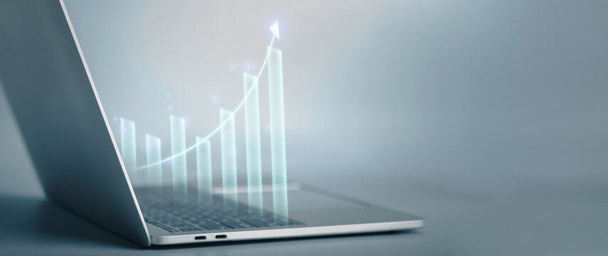 ฺBusiness growth and financial investment concept. Businessmen use laptop to analysis data economic diagram trend show graphs and arrow profit growth, Business planning and strategy success.