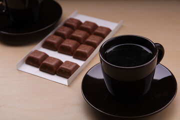 photo two cups of coffee and chocolate