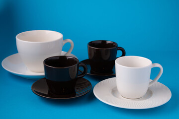 photo of empty coffee cups with saucers