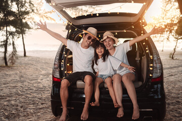 Happy Family with car travel and camping road trip. summer vacation in car in the sunset, Dad, mom...