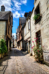 Naklejka premium Charming, Cobbled Street in the Famous Historic Town of Chinon in the Loire Valley, France